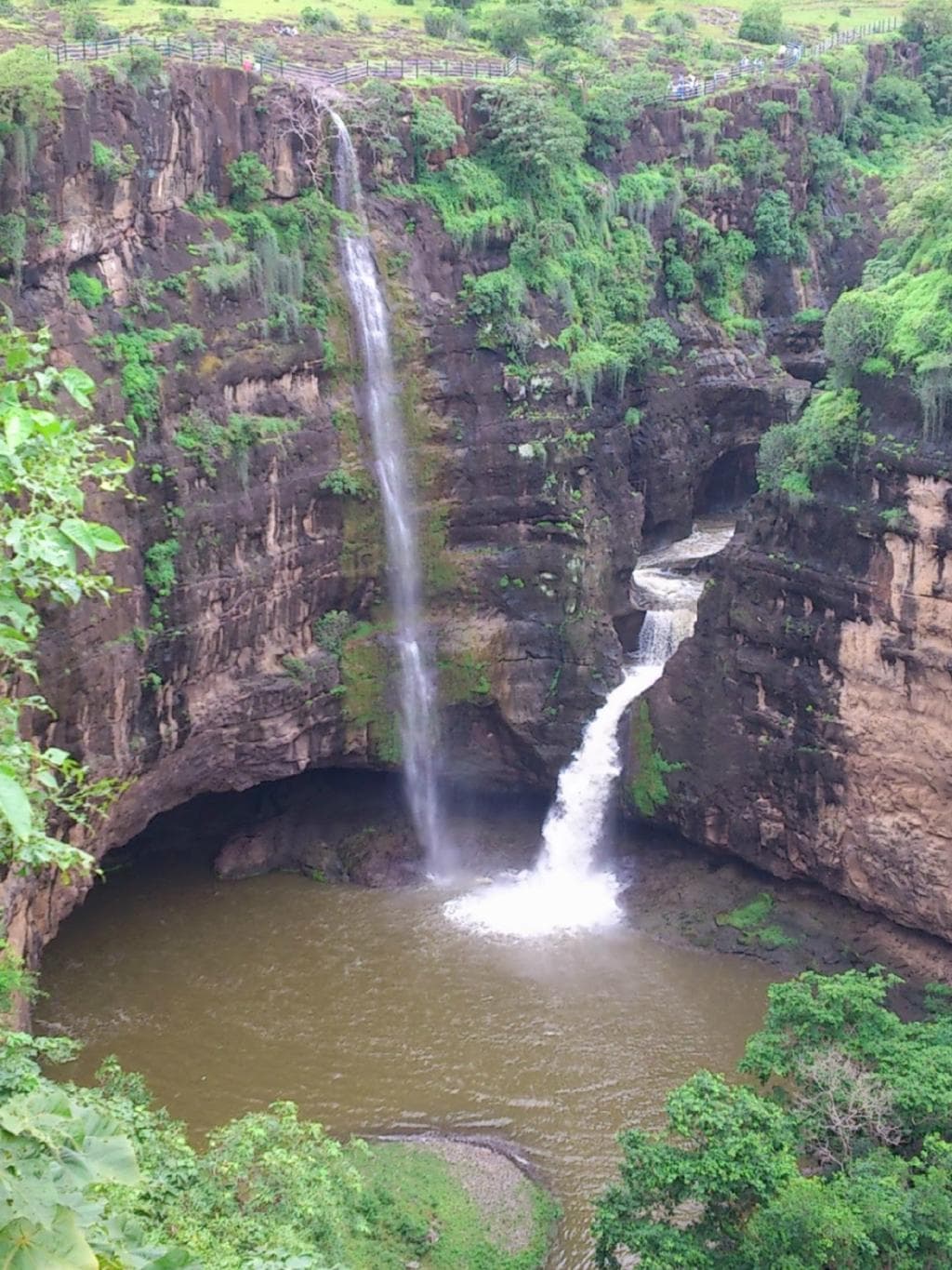 waterfall next to the caves