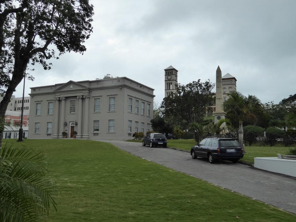 The exterior of the building, with the towers of The Sessions House in the background.