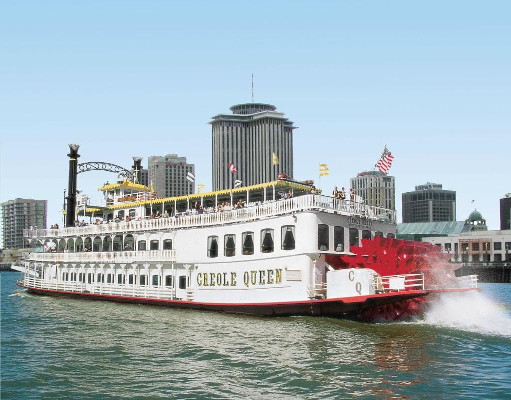 The Paddlewheeler Creole Queen with the New Orleans skyline on the Mississippi River