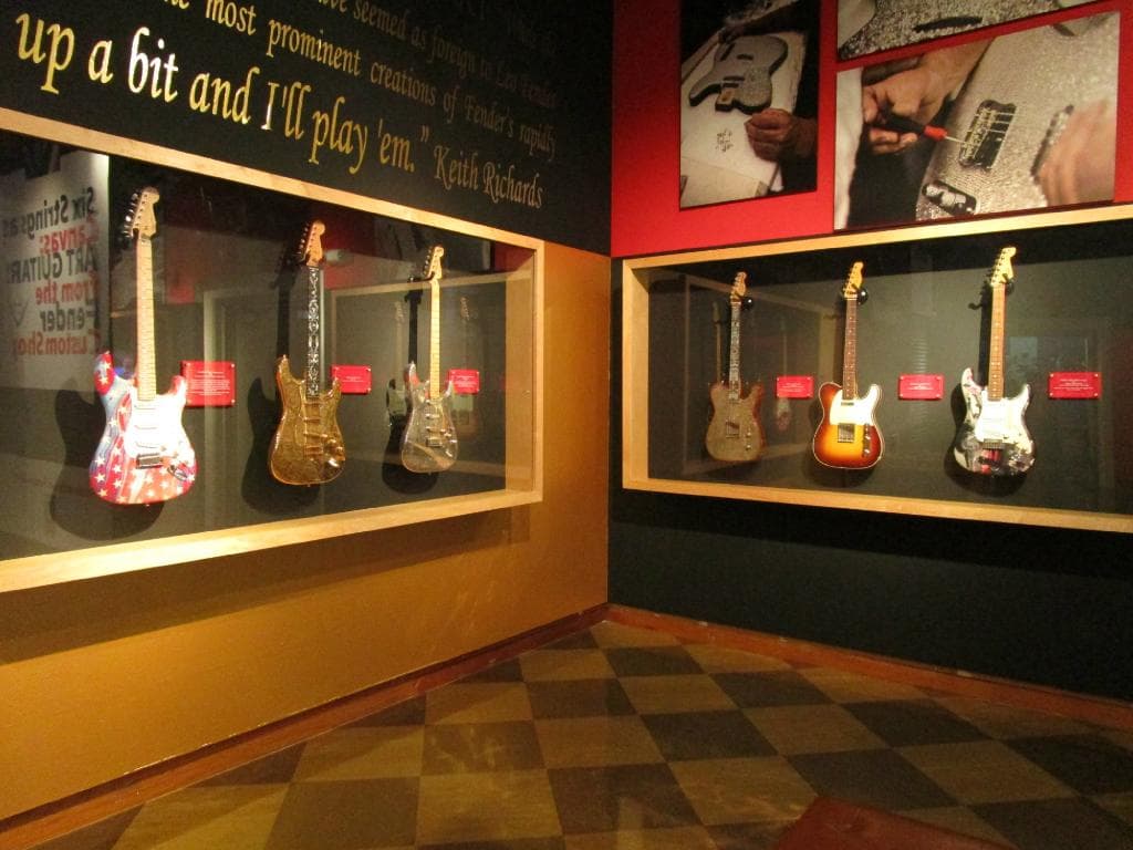 Exhibit cases with Fender "Art Guitars"