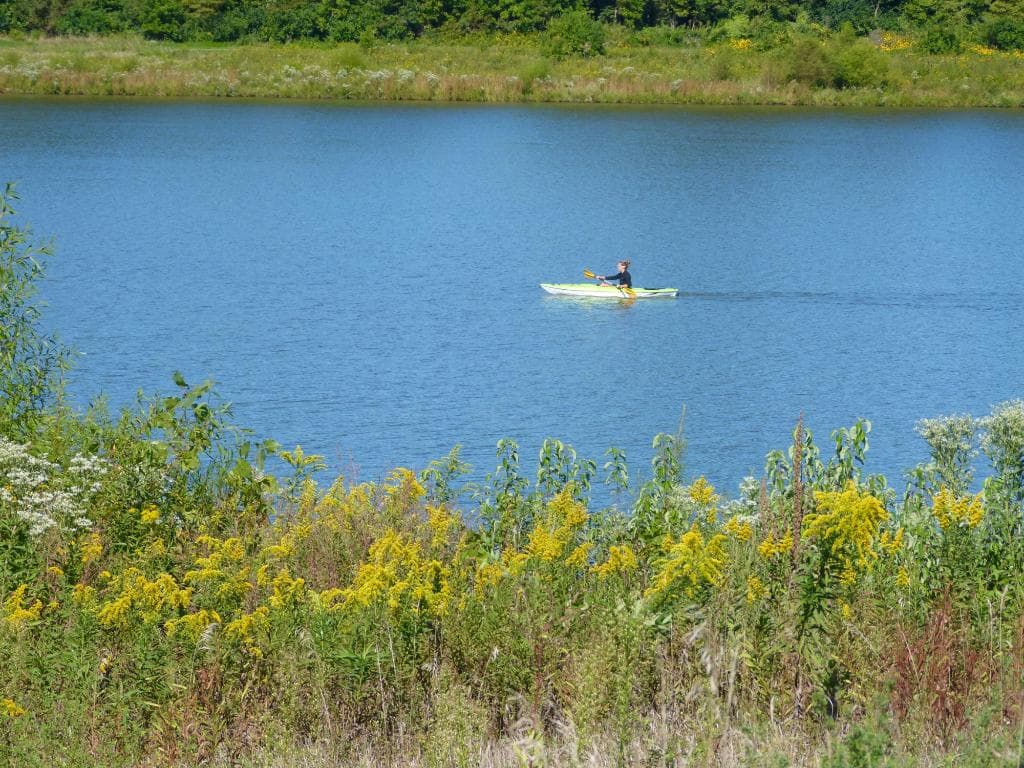 A kayaker on a fine fall day