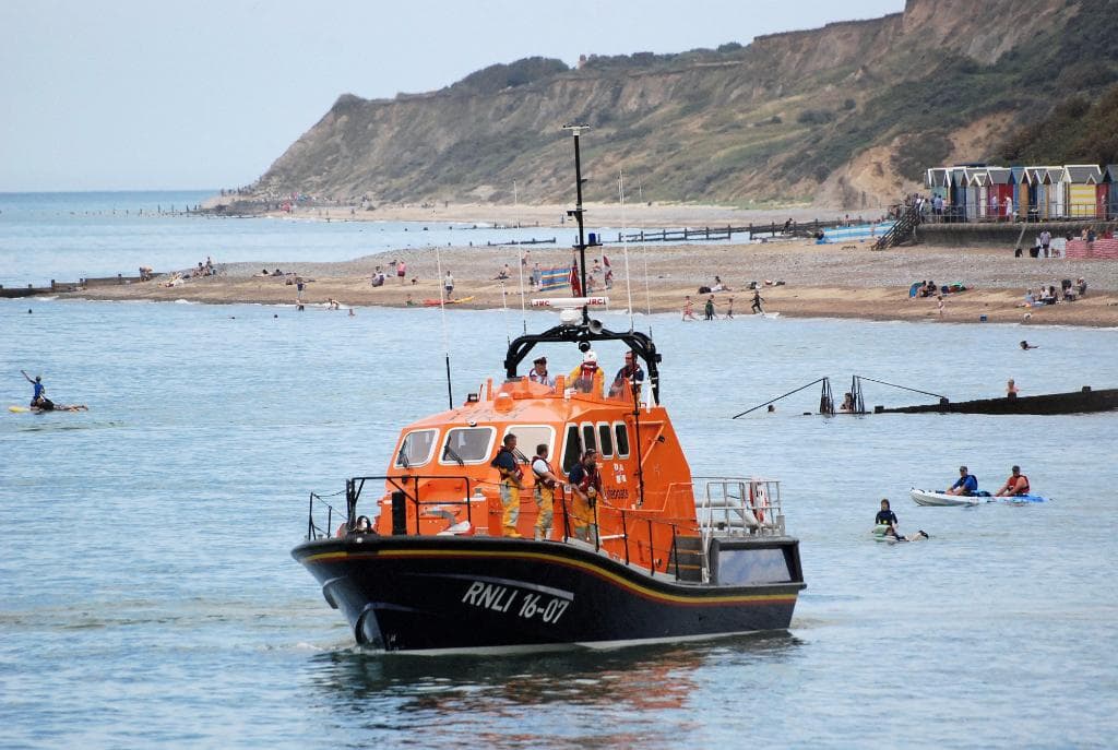Cromer lifeboat near the shore during lifeboat day display.