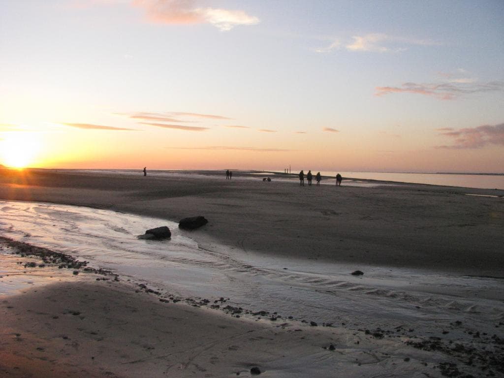 Beach at low tide at sunset