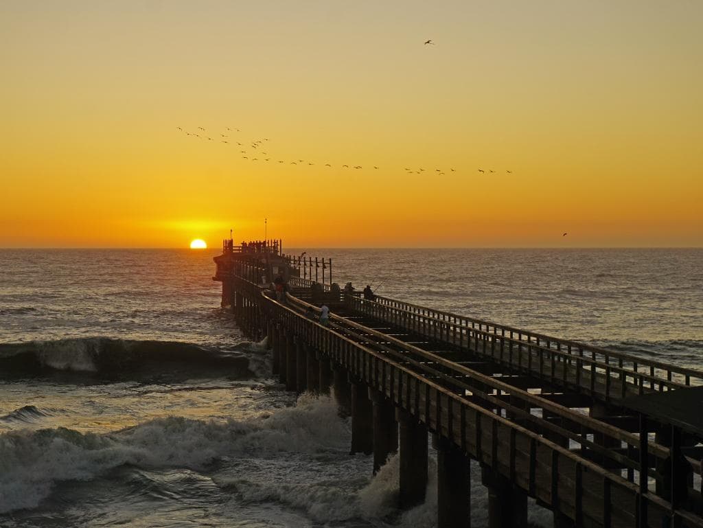 The sun sets over the Atlantic, as seen from the Jetty.