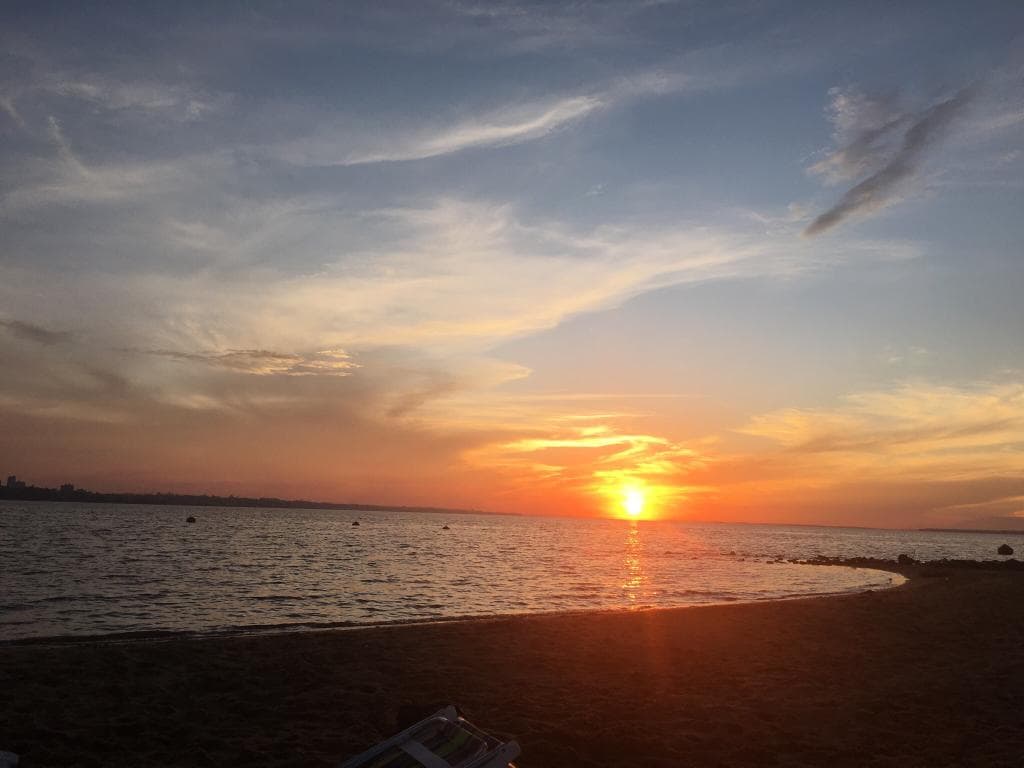 Enjoy beautiful sunsets on San Jose Beach in encarnación, Paraguay. Very clean and lots to do! T