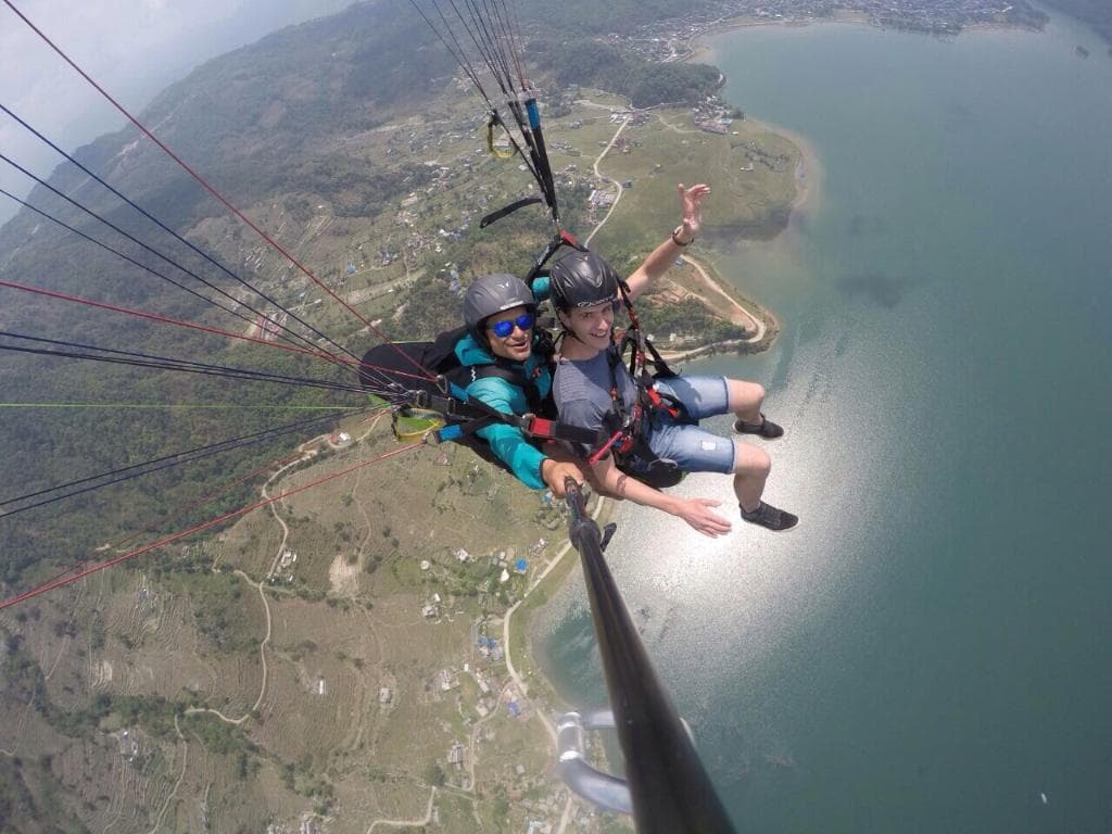 Flyzone adventure pilots with happy guests enjoying their flight