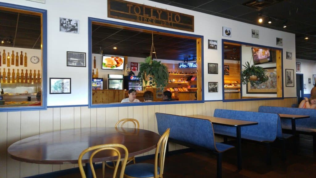 Kids hangout, complete with arcade and pinball games, serving burgers and fries in a neo-malt sh