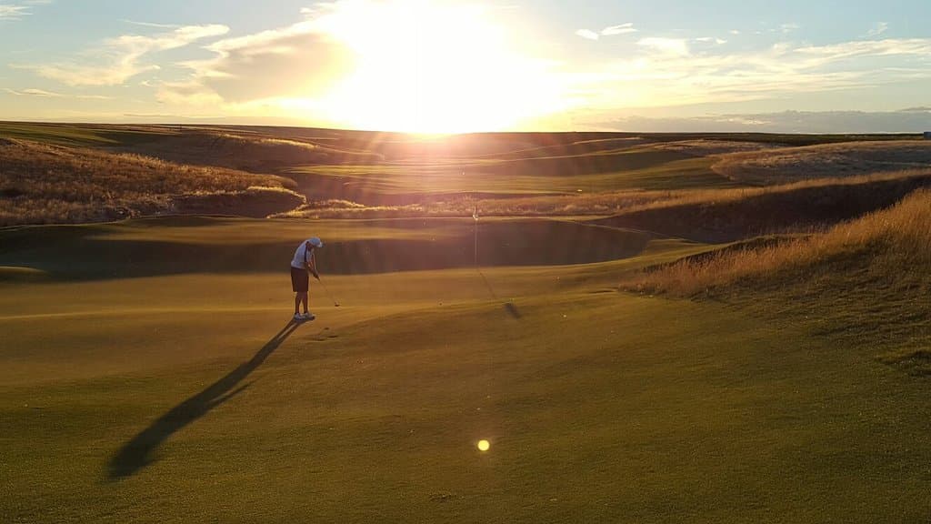 Sunset on 14 green.  Gives you an idea of some of the breaks you can expect on the greens.
