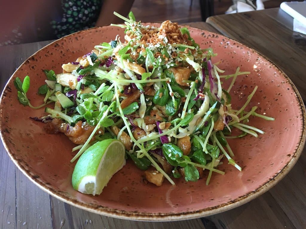 Thai iced tea, lamb curry, spicy chicken wings, roti, ginger chicken salad, ube ice cream