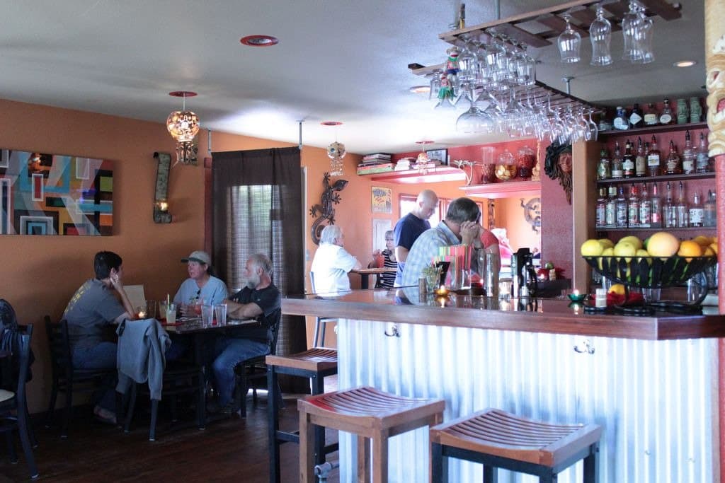 About four or five more small tables that do no show here.