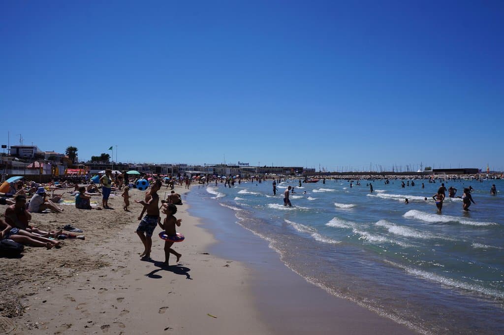 The cleaner side of the beach. Regardless, you're always swimming with some trash floating with 