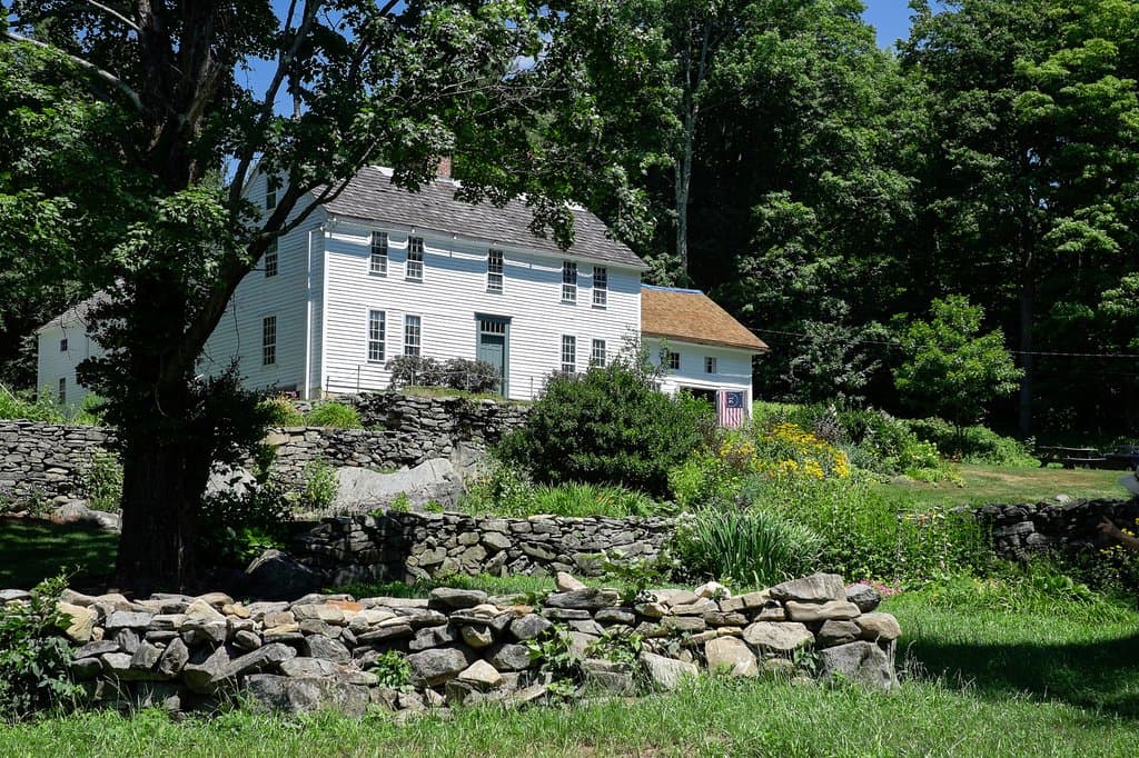 Exterior, with flag, picnic table, flowers...