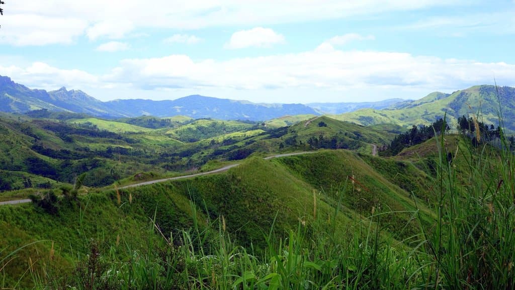 Panoramic view of the highlands and the road through them.