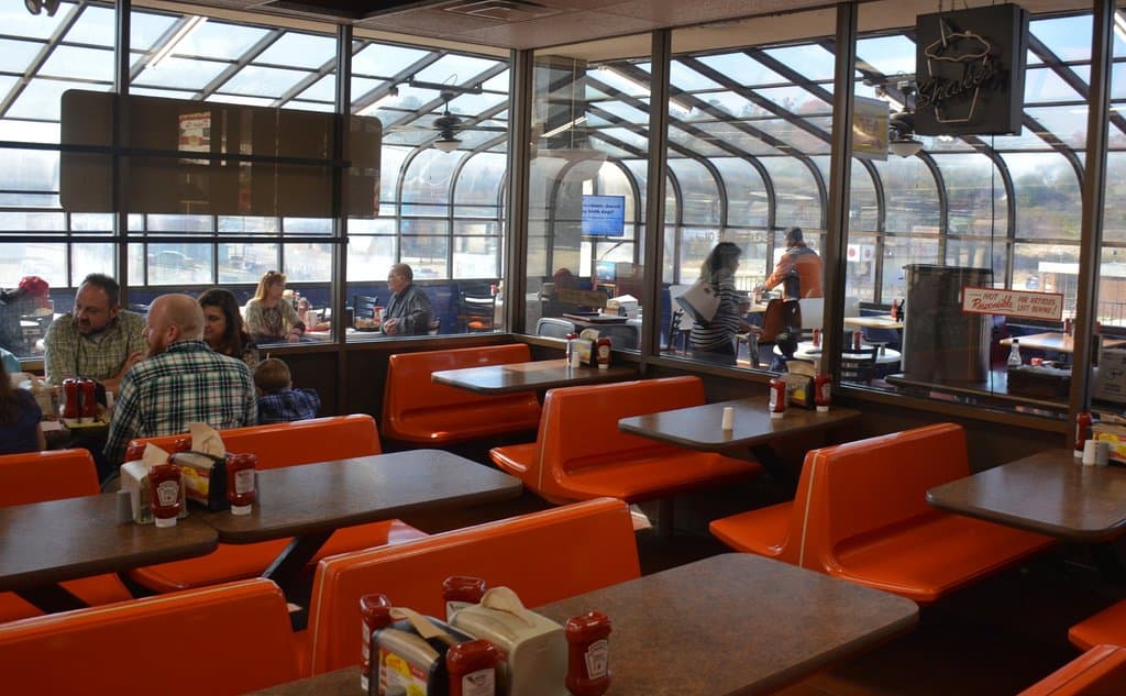 Main dining room with atrium dining area in back