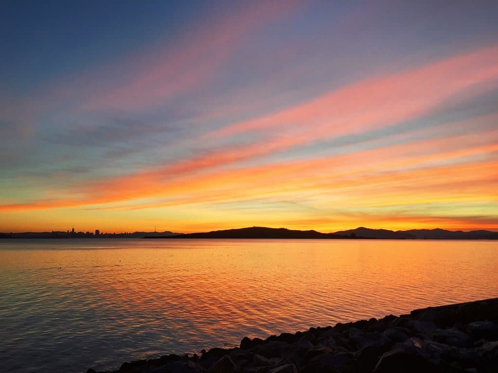 Sunset views of Brooks Island and San Francisco.