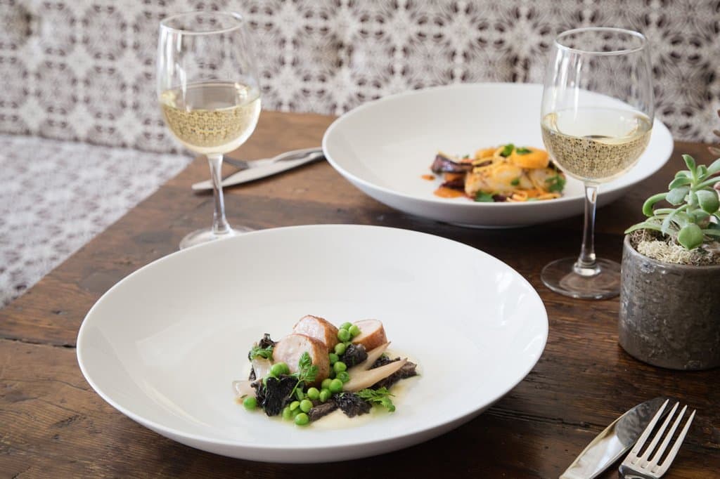 Foie Gras Stuffed Roasted Chicken w/Morels & English Peas // Glazed Hake with Carrot-Chipotle Sa