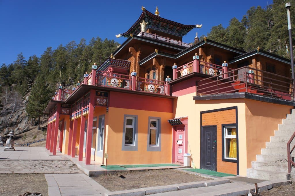 A view of the monastery. The entrance is the small red door to the right side.