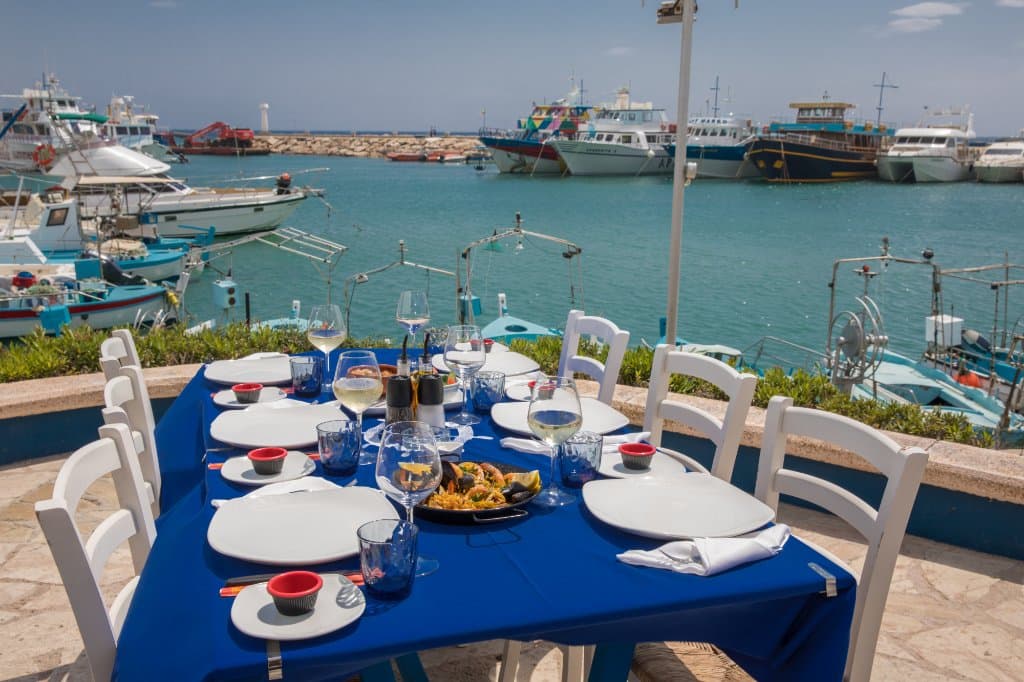 Table setting with an amazing view of the Meditterenean