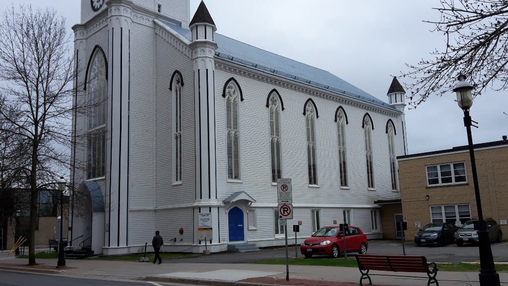 base of the church, bright blue door