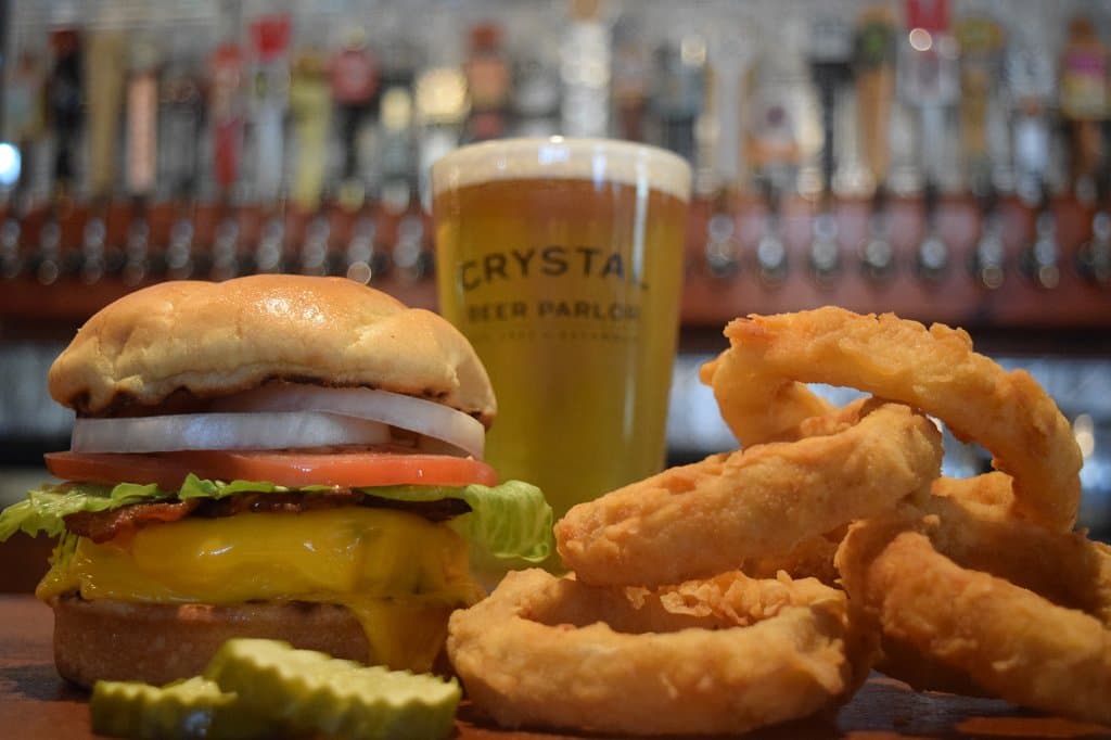 Classic Crystal Burger with homemade onion rings.