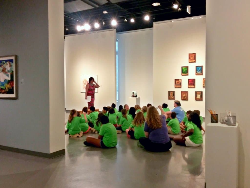 Students listen to a guided tour of one of SAM's contemporary exhibits (2017)