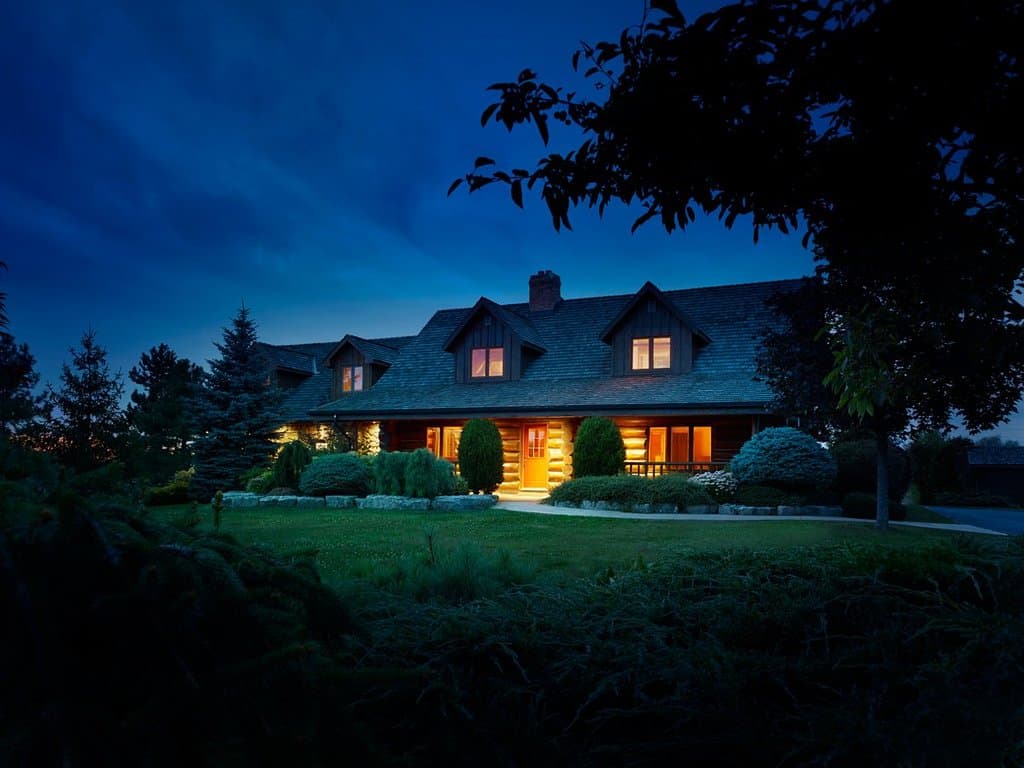 The tasting room is in a beautiful log house overlooking a beautiful property and pond.