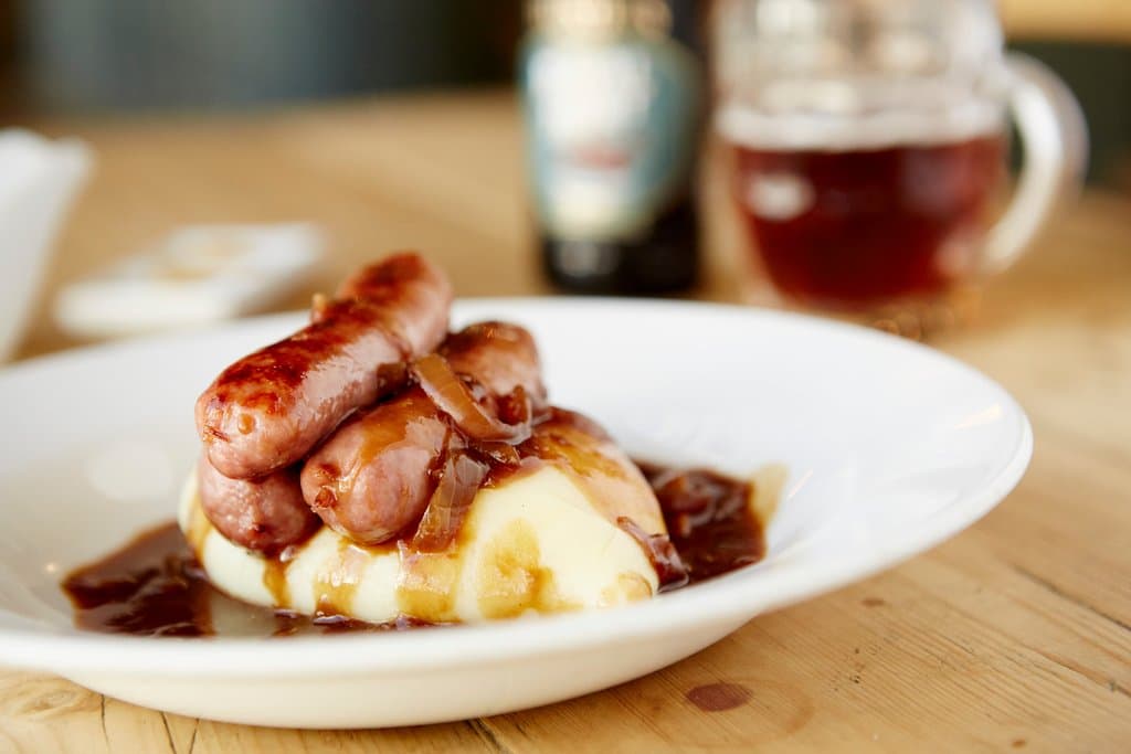 Gloucester old spot traditional pork sausage, served with mash & onion gravy