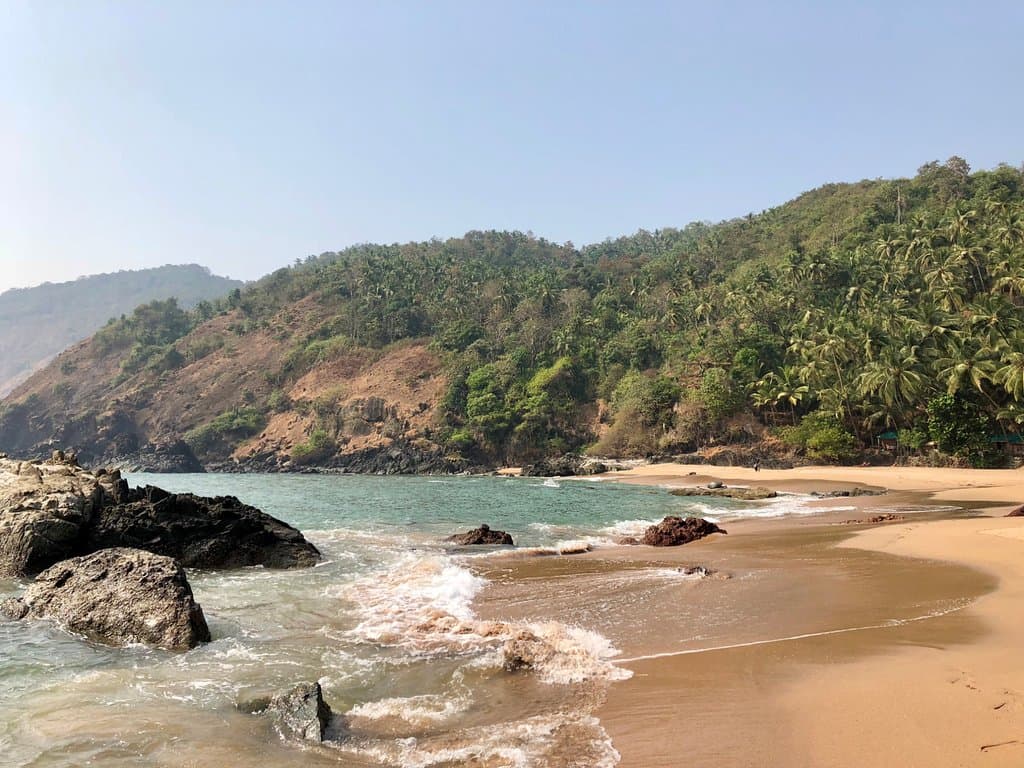 The beach shore is fairly steep, it will pull you back