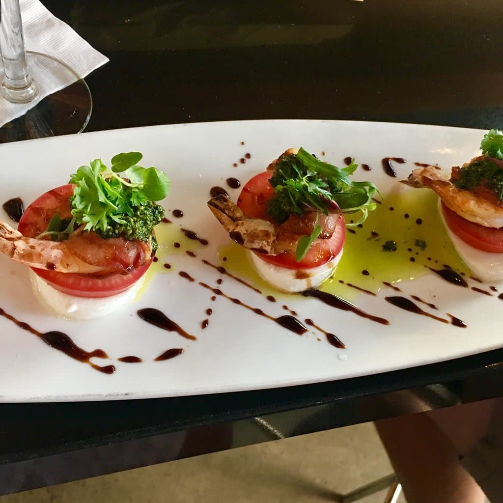 PROSCIUTTO 🍤 (vine ripe🍅, mozzarella, herb pesto, balsamic)=$18