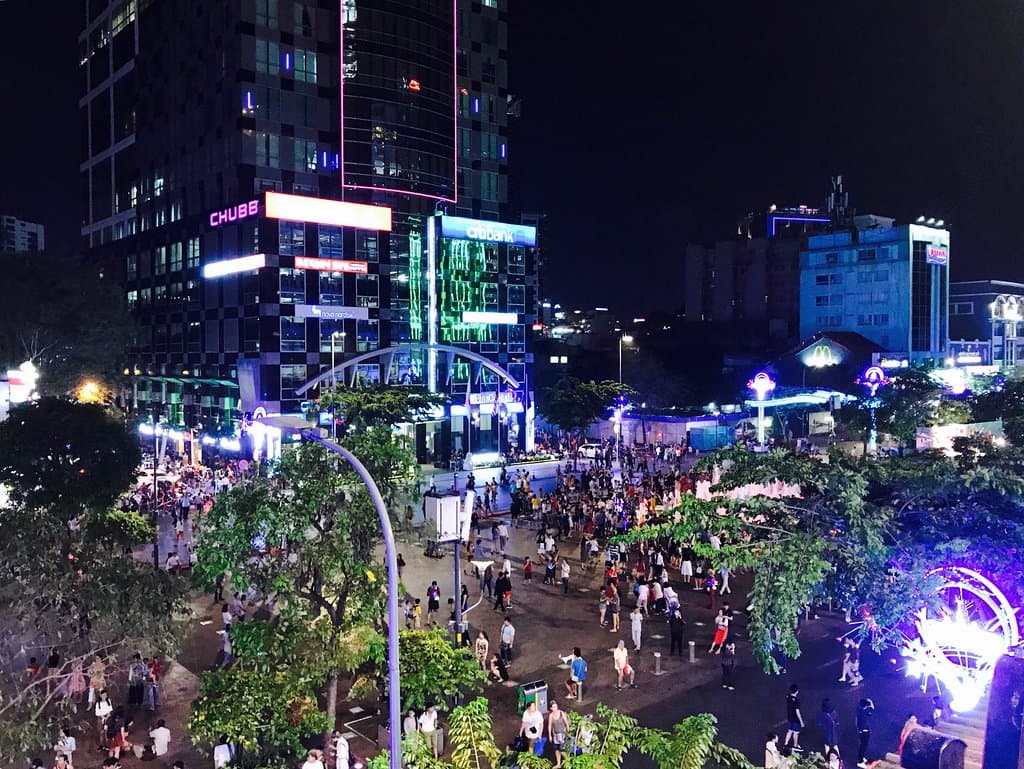 Lot of family and friends in the walking street - view from cafe apartments