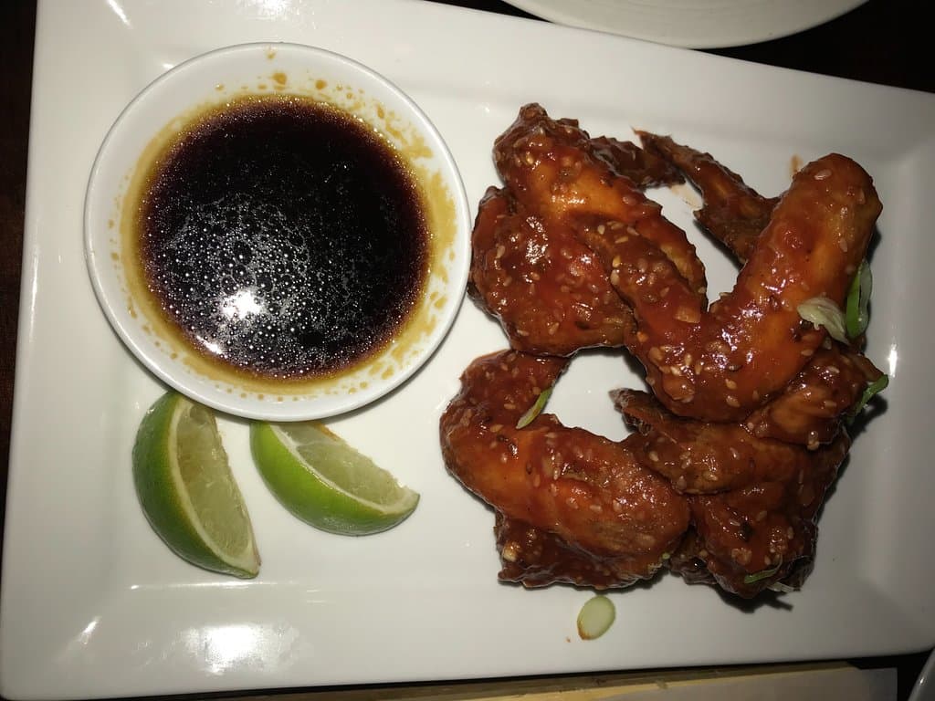 Korean-style fried chicken wings with honey-lime Sriracha sauce