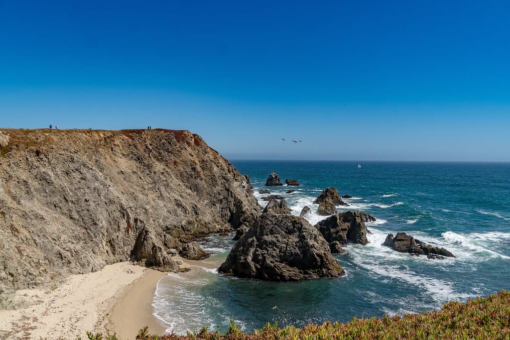 Secluded beach beneath cliffs