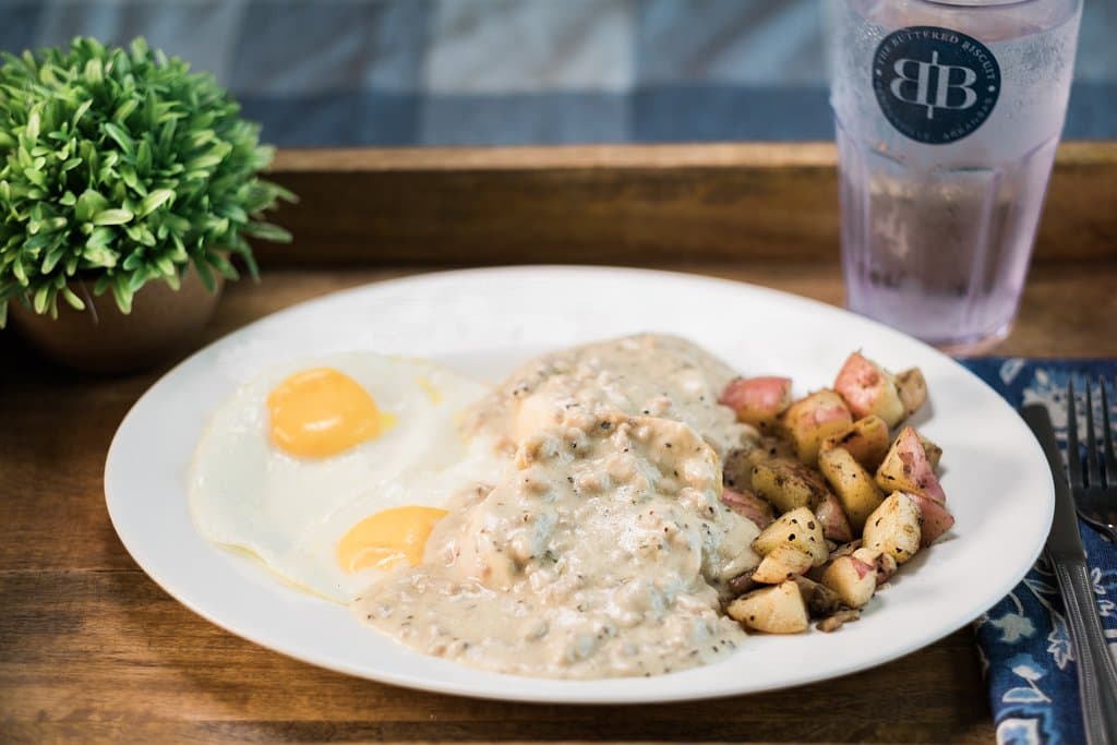 Signature Biscuits and Gravy house cut Redskin Potatoes and two Fresh Eggs 