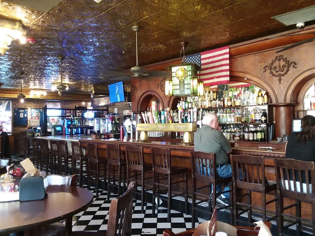 This is the main bar area. You can see all the tappers for beer. Table seating across from the b