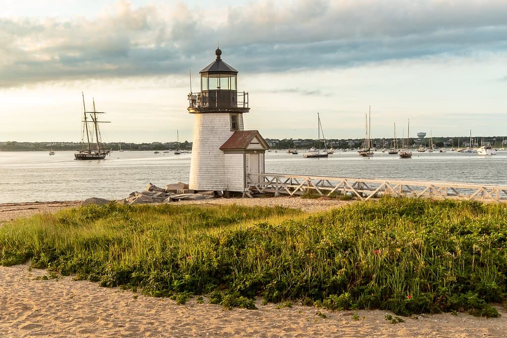 Brant point light looking to the southeast. The tallship to the left is teh Lynx.