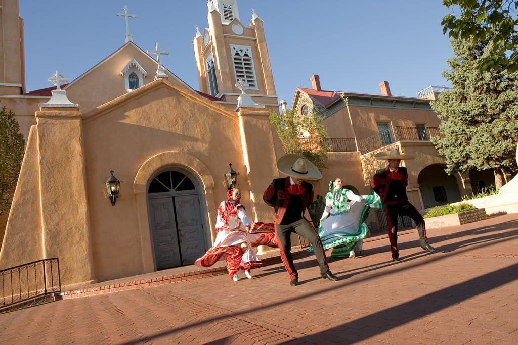 Folklorico dancers in front of historic San Felipe de Neri Church.