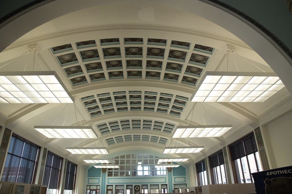 Ceiling to left as you enter the main entrance...