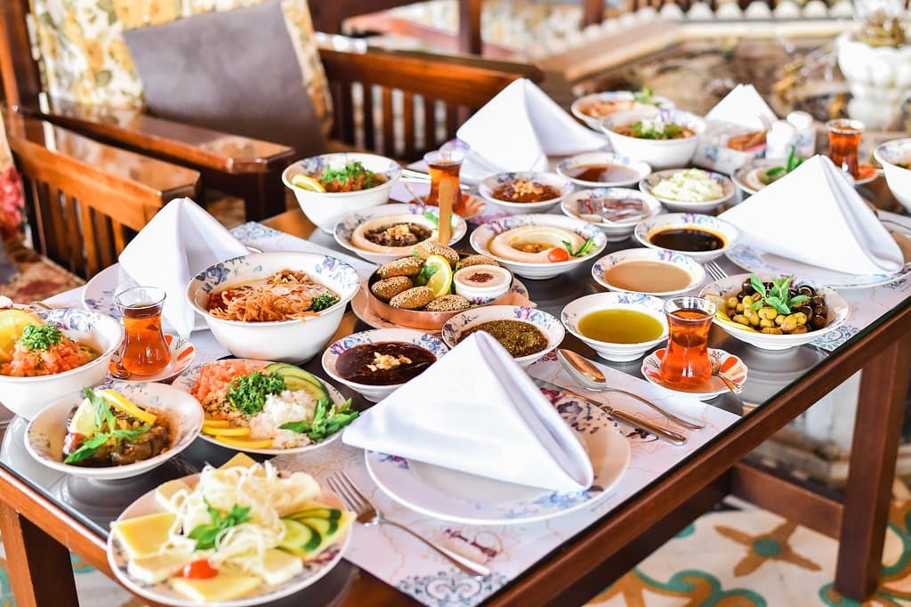 Middle eastern cuisine, Syrian dishes, Authentic flavors, Damascus-inspired recipes, Shawarma, Hummus, Falafel, Kebabs, Mediterranean flavors, Exotic spices, Vegetarian options, Mezze platters, cozy atmosphere, Exquisite desserts 