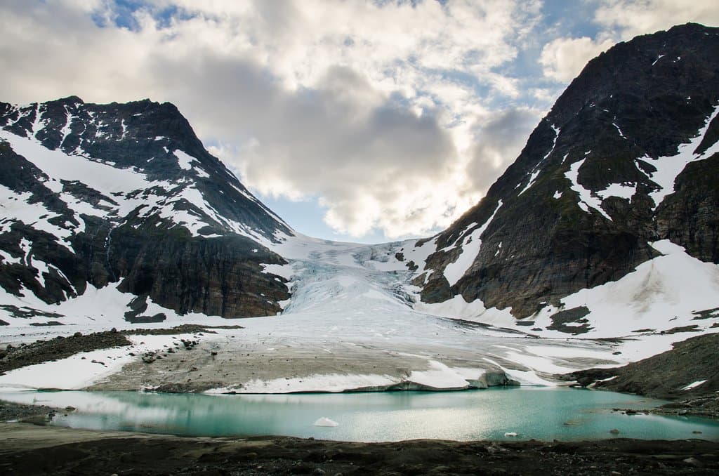 The glacier lake and glacier become fully visible only after the hard walk over the moraine. But it's totally worth it. 