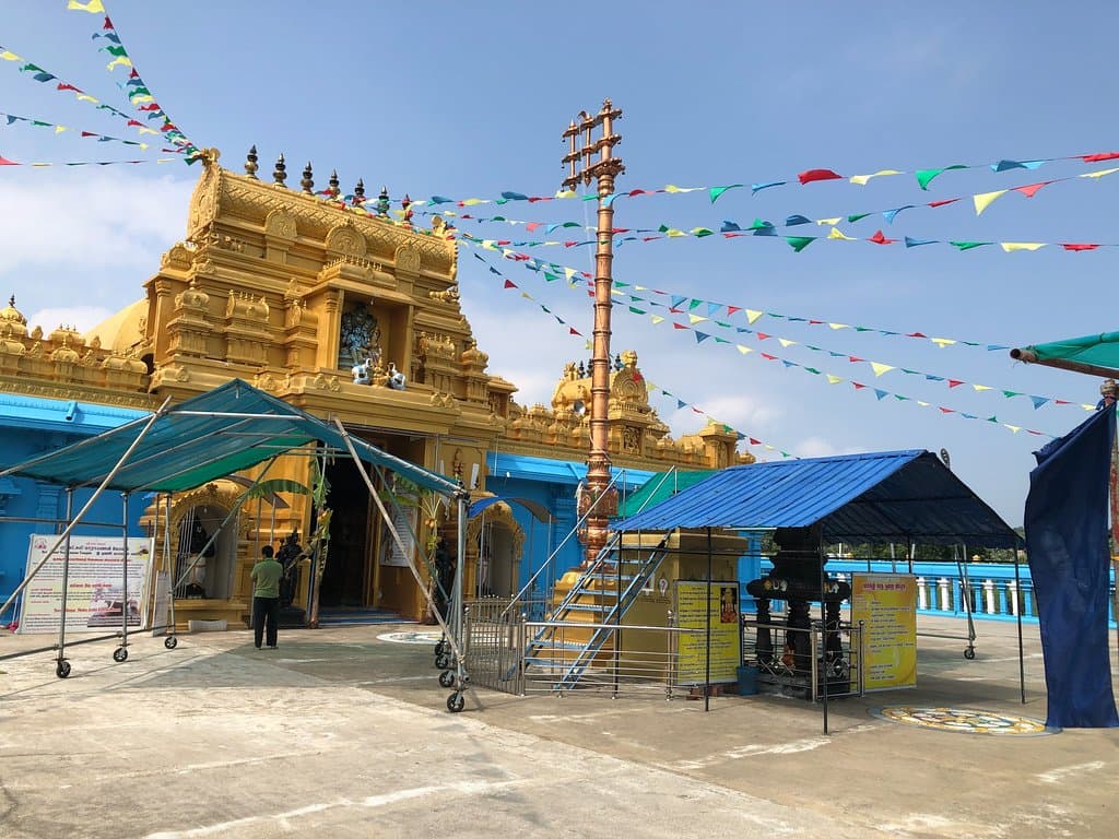 Tarp-covered pathways leading to the entrance of the temple. Keeping the hot sun at bay.