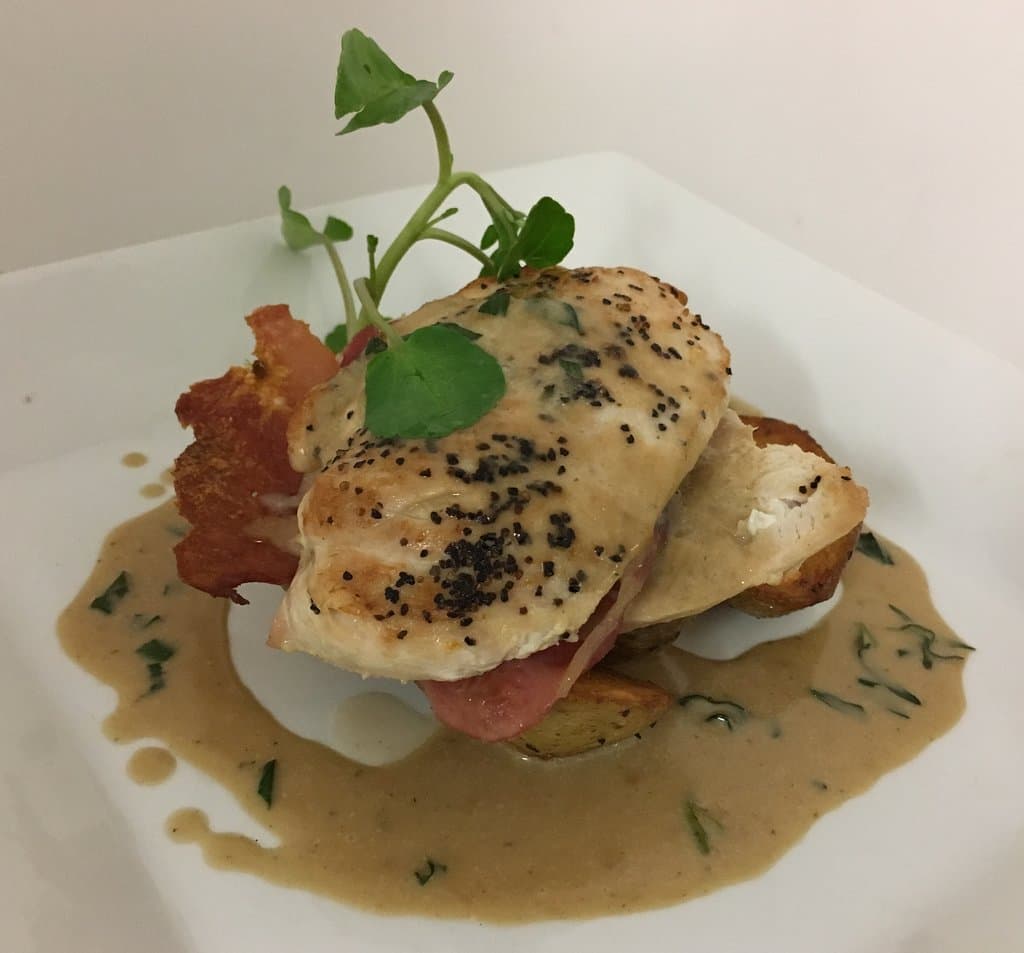 Supreme of Chicken Breast,
Crispy bacon, sauteed potatoes, tarragon and  mustard sauce.