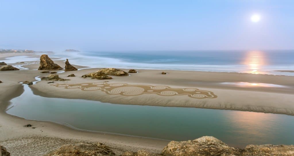 Circles in the Sand labyrinth artist Denny Dyke creates walkable art on the beach in Bandon, Oregon.  The Circles Team has been creating labyrinths at Face Rock Viewpoint since January 2015.  There is a single path that meanders throughout the spirals and labyrinths with no wrong turns or dead ends.  Schedule depends on tides and is posted on our website www.sandypathbandon.com.
email:  circles@sandypathbandon.com
Events subject to closure to due bad weather.  Check current calendar.
