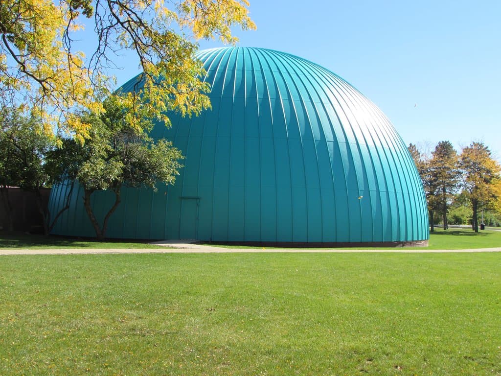 Longway Planetarium is known for its iconic teal dome, a well-loved Flint landmark in the Cultural Center campus.