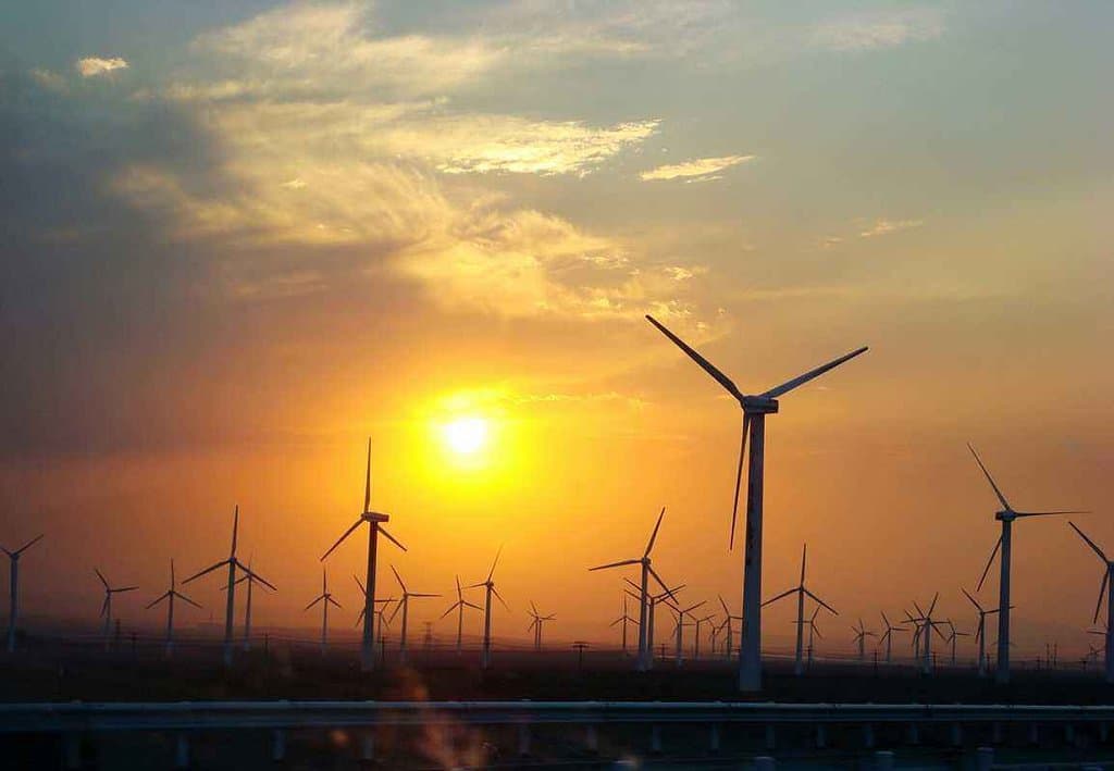 wind turbines of dawancheng near Urumqi,Xinjiang,China. It is on the way from Urumqi to turpan. It is the corridor of tianshan mountain and cold air from Russian Siberia would come into tarim basin and make a very strong wind here most of the year and that`s why they continuously building these turbines here.