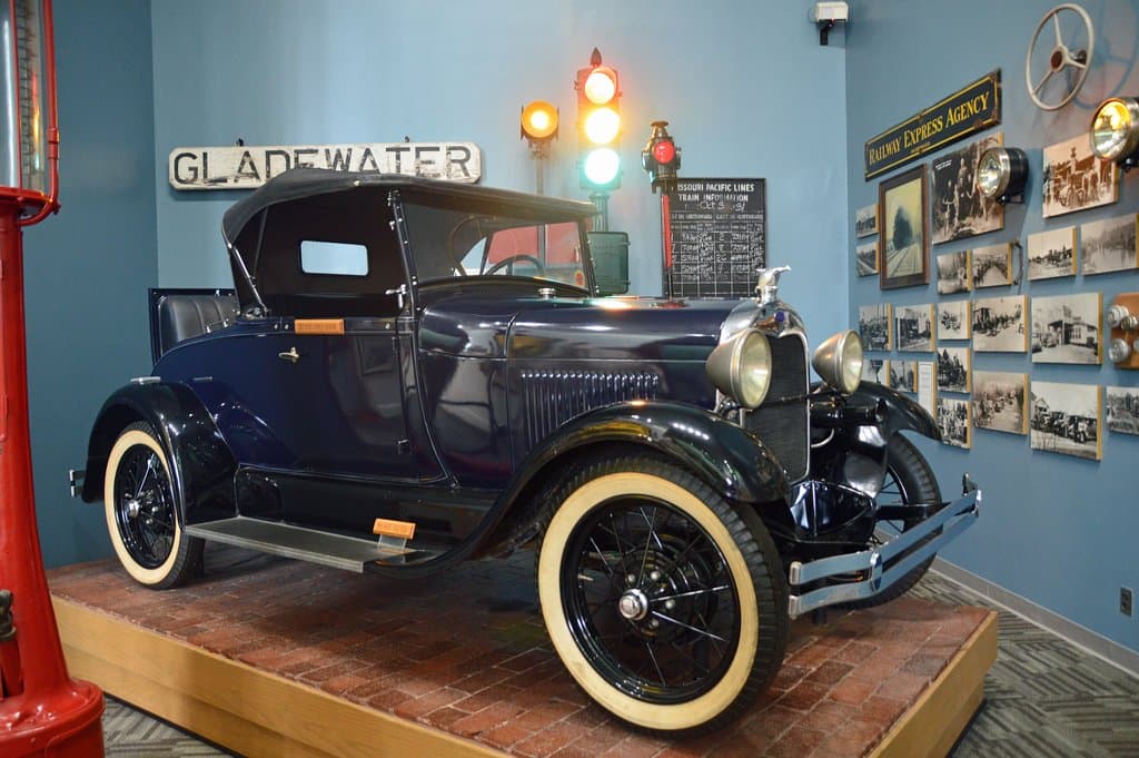 The bricks under the Model A with a Rumble seat are from the city streets of Longview, Texas