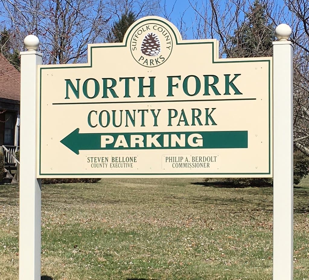 The sign next to the driveway into the park. This sign is easily visible from Sound Avenue.