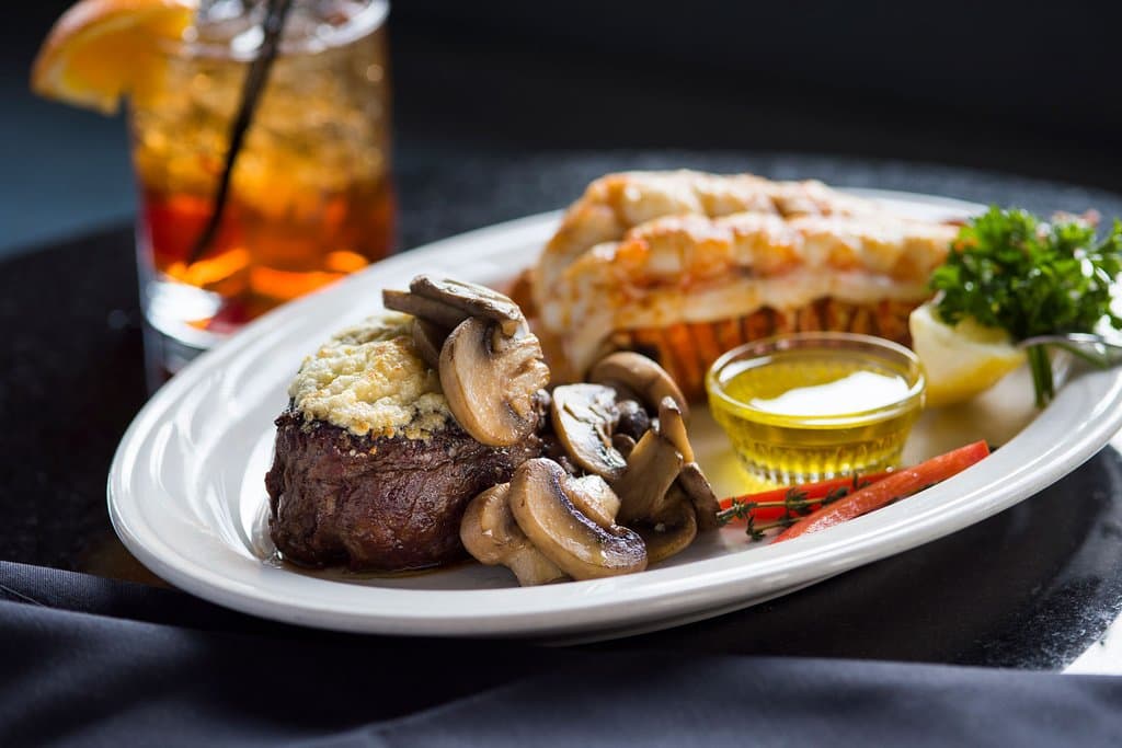 7 oz Filet topped with blue cheese and mushrooms, served with a 6 oz Lobster Tail add on.
