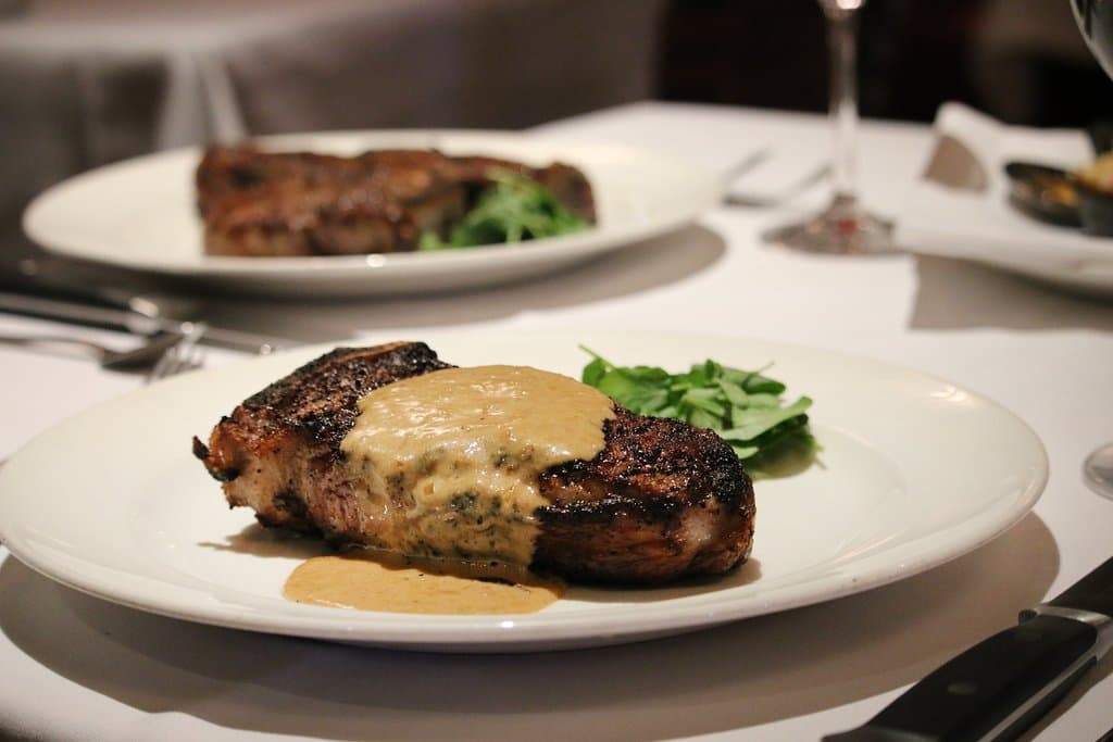 Dry Aged Ny Strip Au Poivre With Courvoisier Cream - 14 Oz.  
