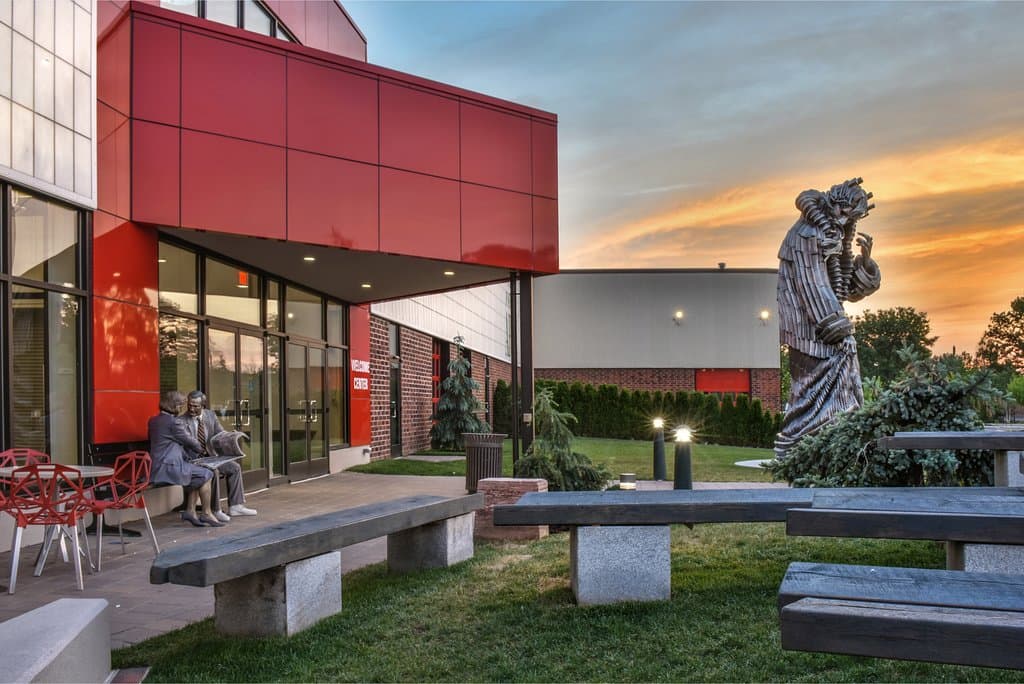 The entrance at Grounds For Sculpture under a twilight sky, with Seward Johnson's monumental sculpture, "King Lear" to herald your arrival.