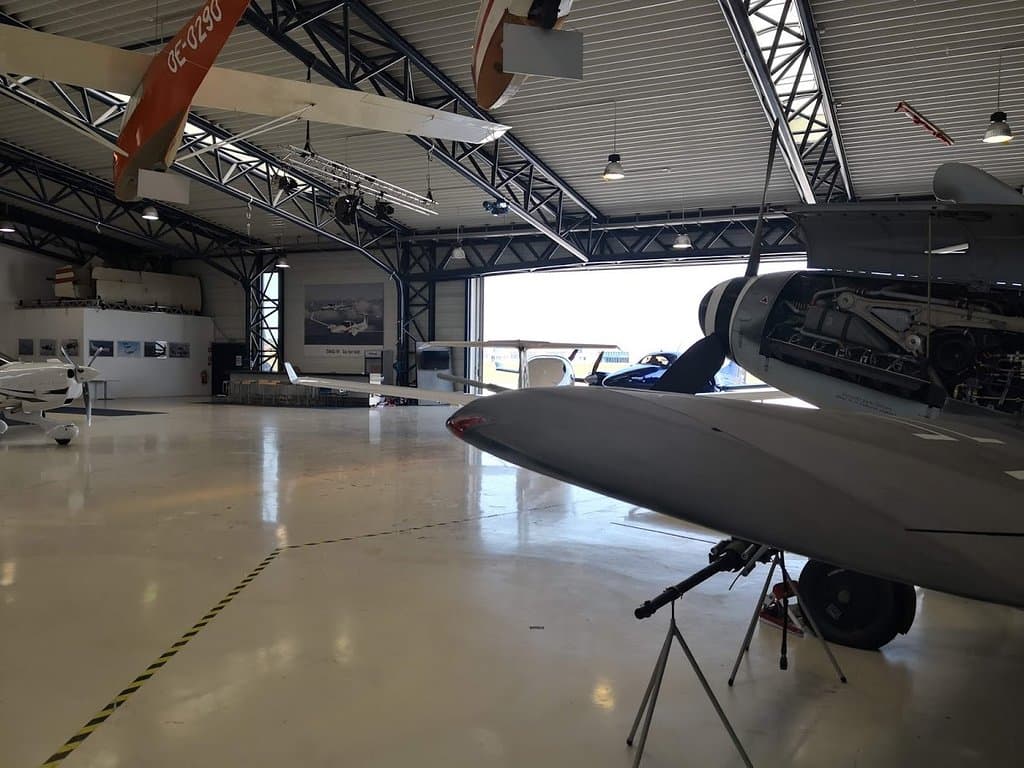 Hangar with exhibition of planes.